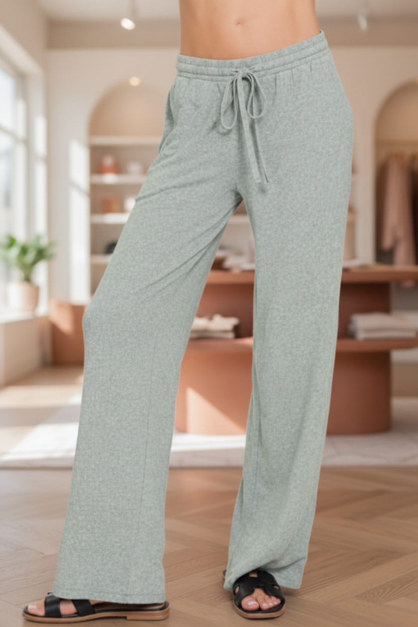 Ash-jade pants in boutique setting