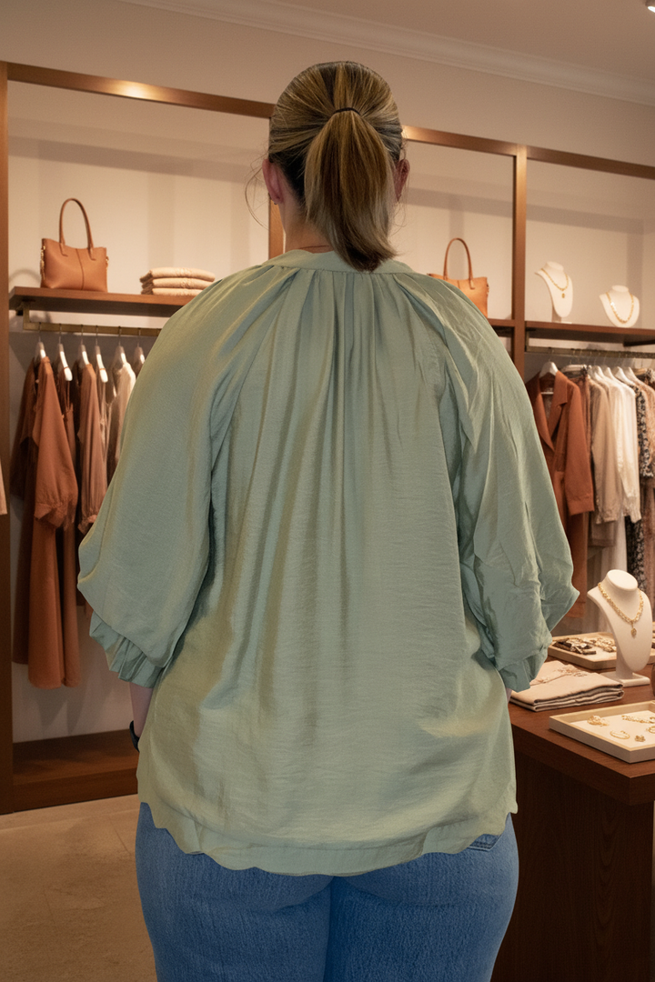 Back view — boutique background