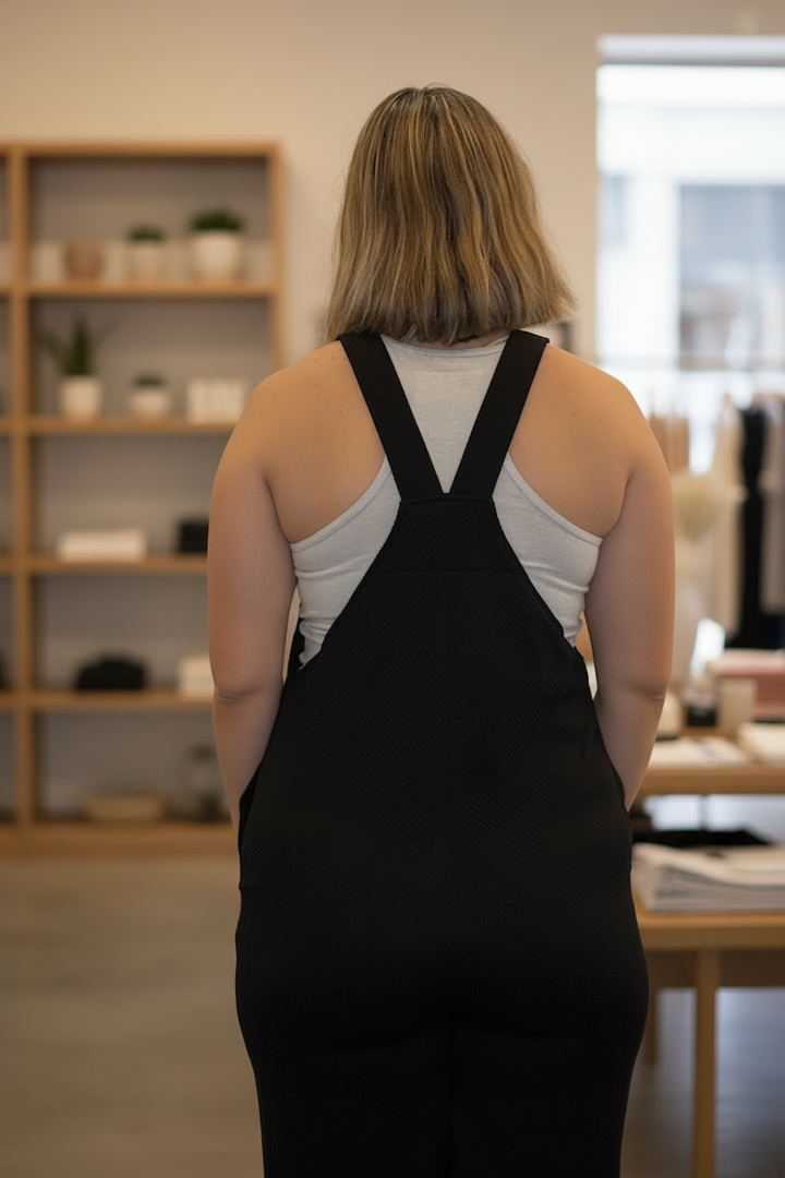 Back view with boutique background