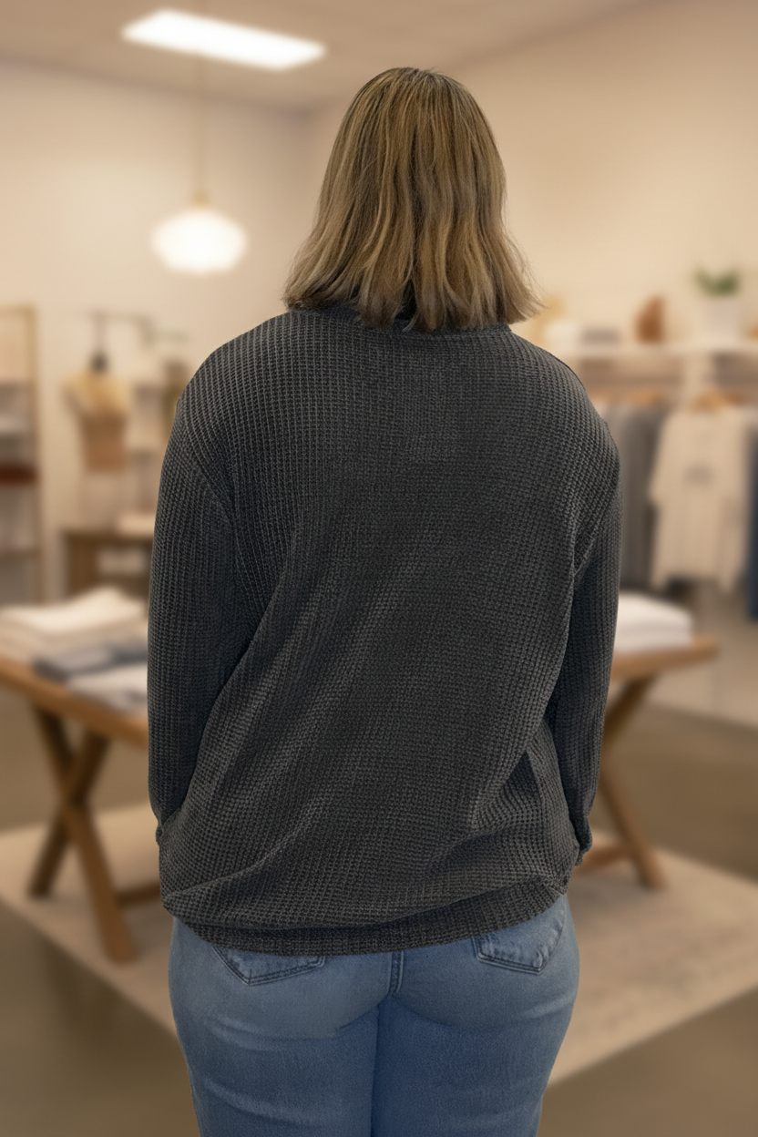 Back view with boutique background