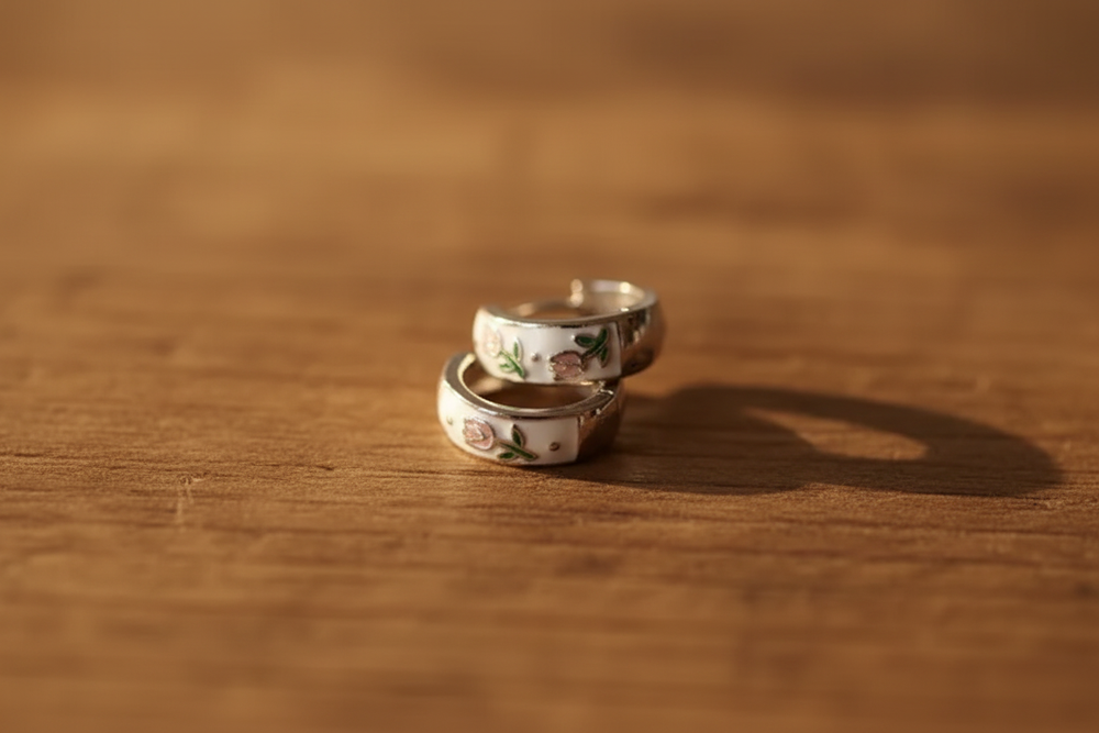 Earrings on warm wood surface