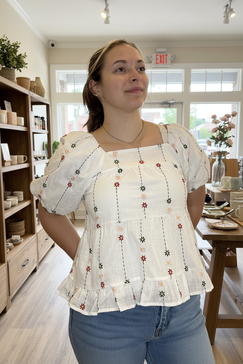 Embroidered Daisy Peplum - Front - Boutique Background