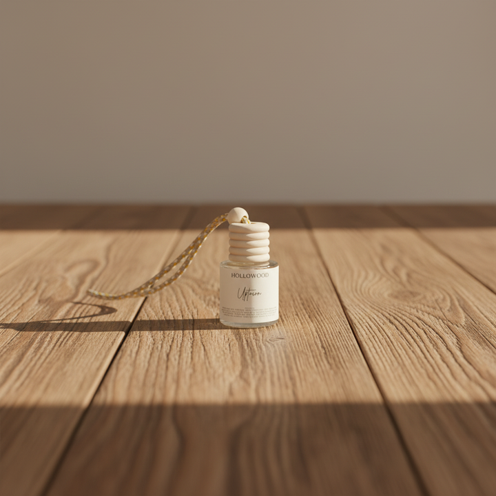 Uptown Everyday Car Diffuser on a wooden table