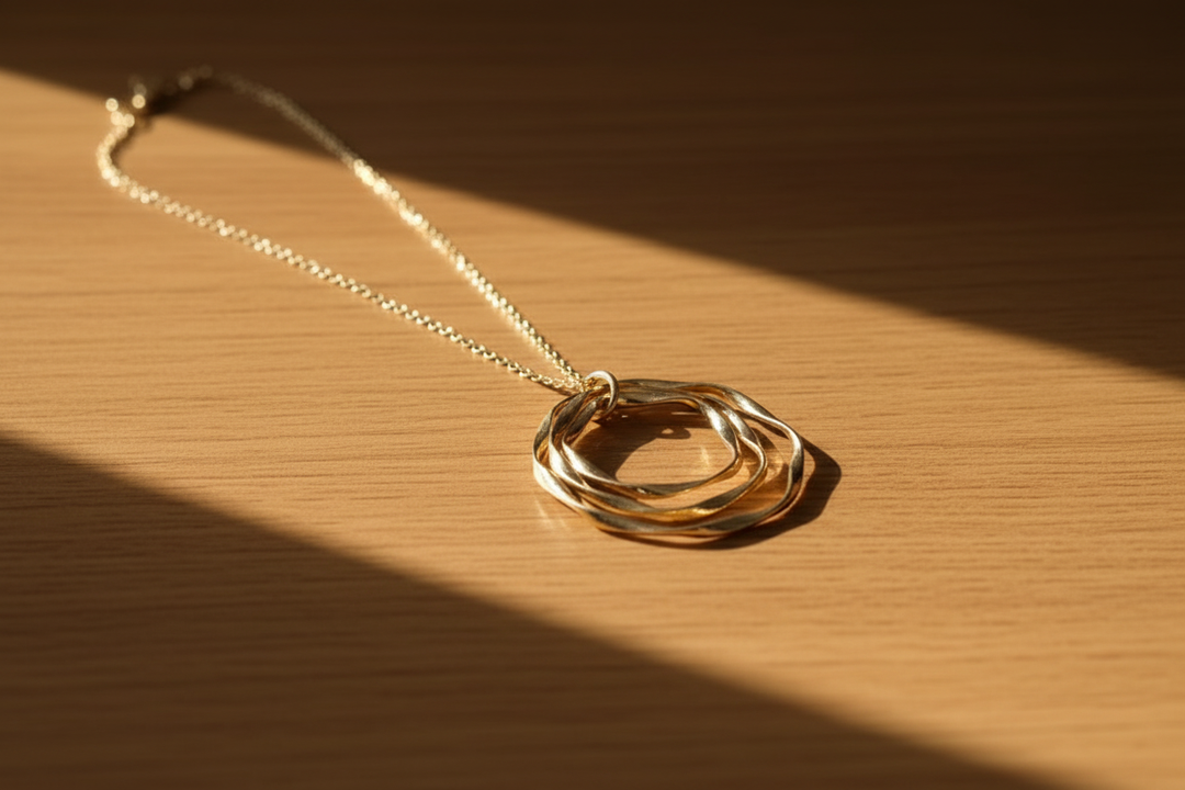 Gold necklace - sunlit wood