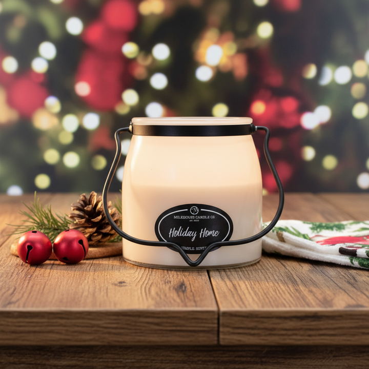 Milkhouse holiday home 16oz butter jar candle on warm rustic wooden table lifestyle product photography
