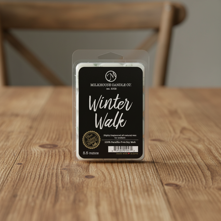 Milkhouse frosted pine 5.5oz wax melt on warm rustic wooden table lifestyle product photography