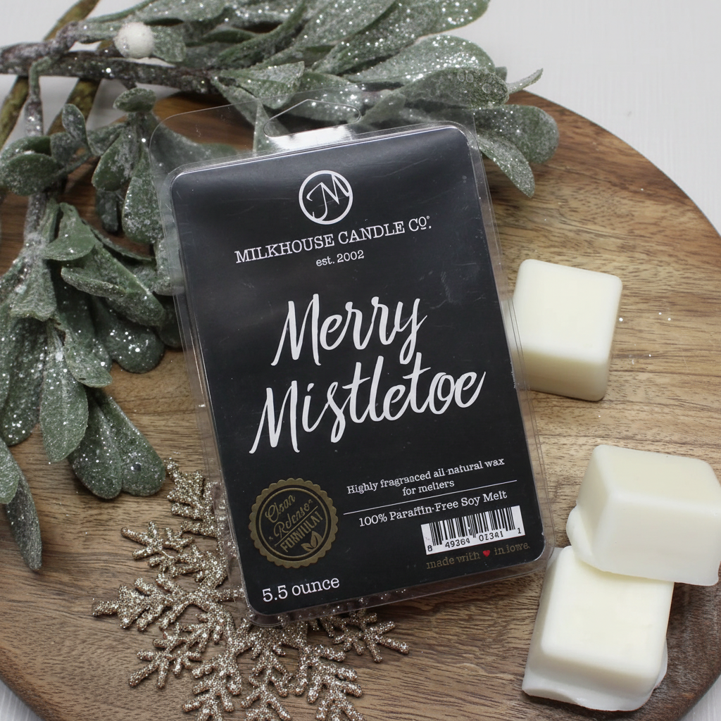 Milkhouse mistletoe 5.5oz wax melt on warm rustic wooden table lifestyle product photography