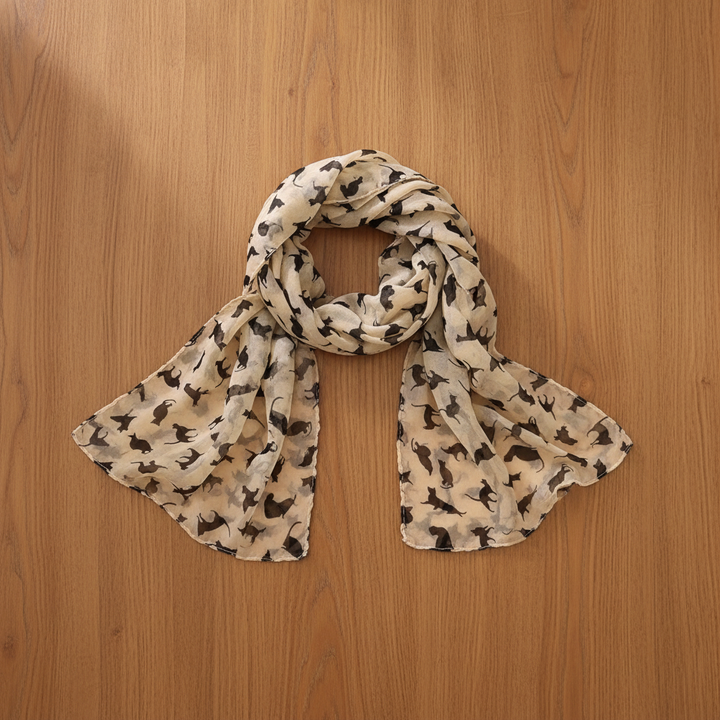 Black cat pattern fashion scarf flat lay on wood table