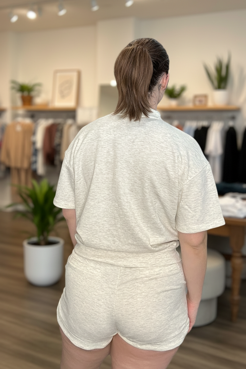 Heather vanilla lounge set back view with blurred boutique background