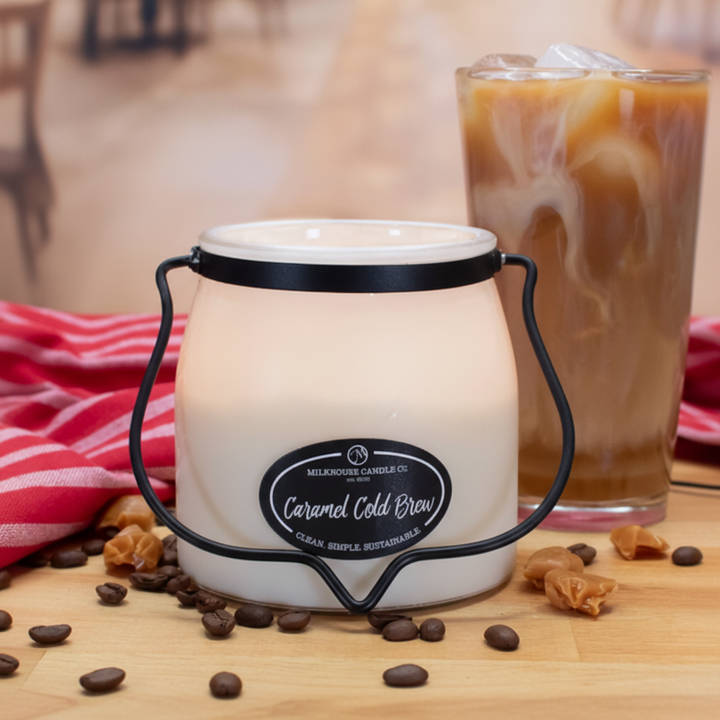 Milkhouse coffee caramel 16oz butter jar candle on warm rustic wooden table lifestyle product photography