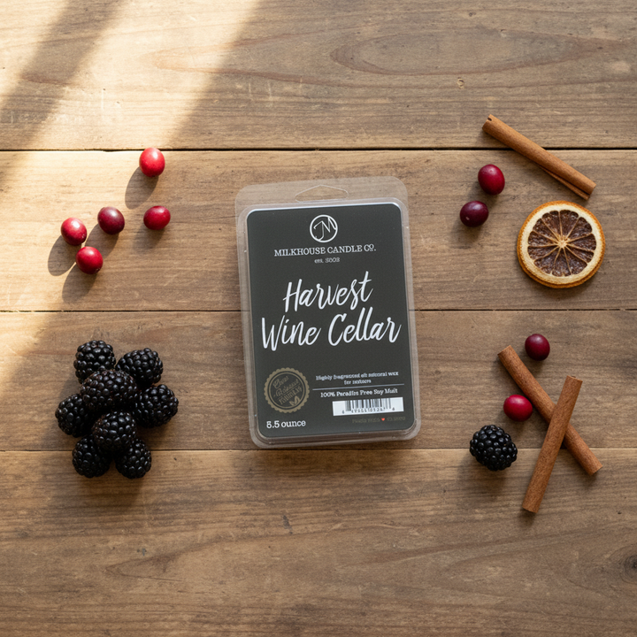 Milkhouse harvest wine cellar 5.5oz wax melt on warm rustic wooden table lifestyle product photography