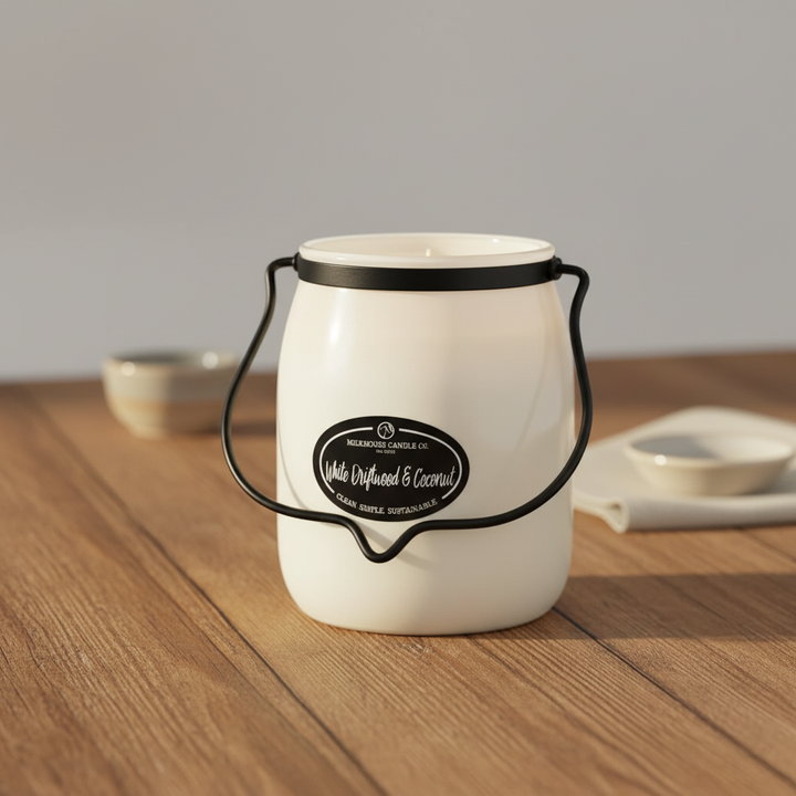 Milkhouse driftwood coconut 16oz butter jar candle on warm rustic wooden table lifestyle product photography