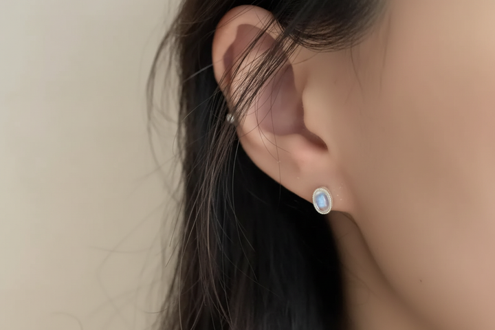 Moonstone earring worn on ear