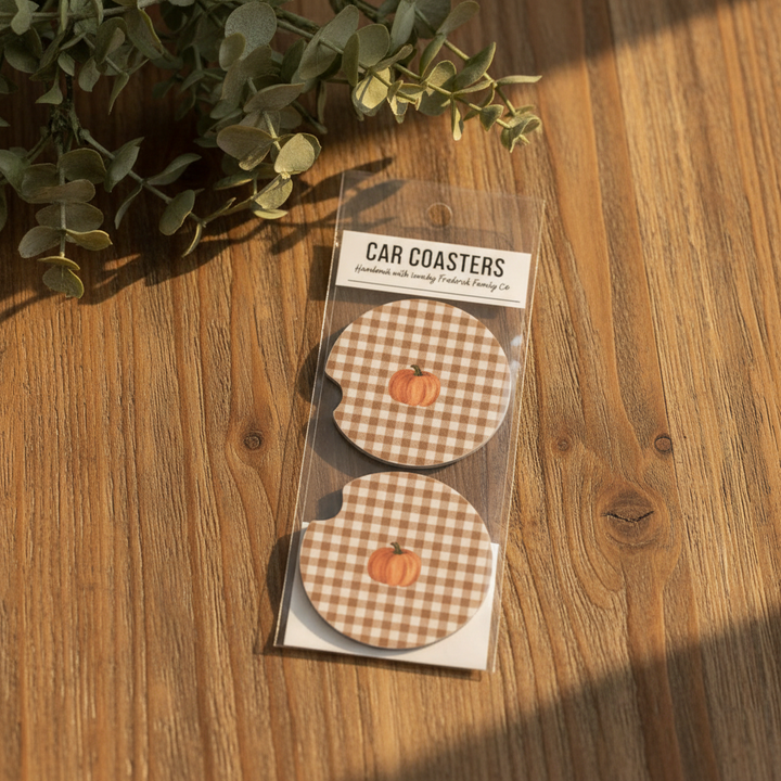 Pumpkin Plaid Car Coasters on warm wood