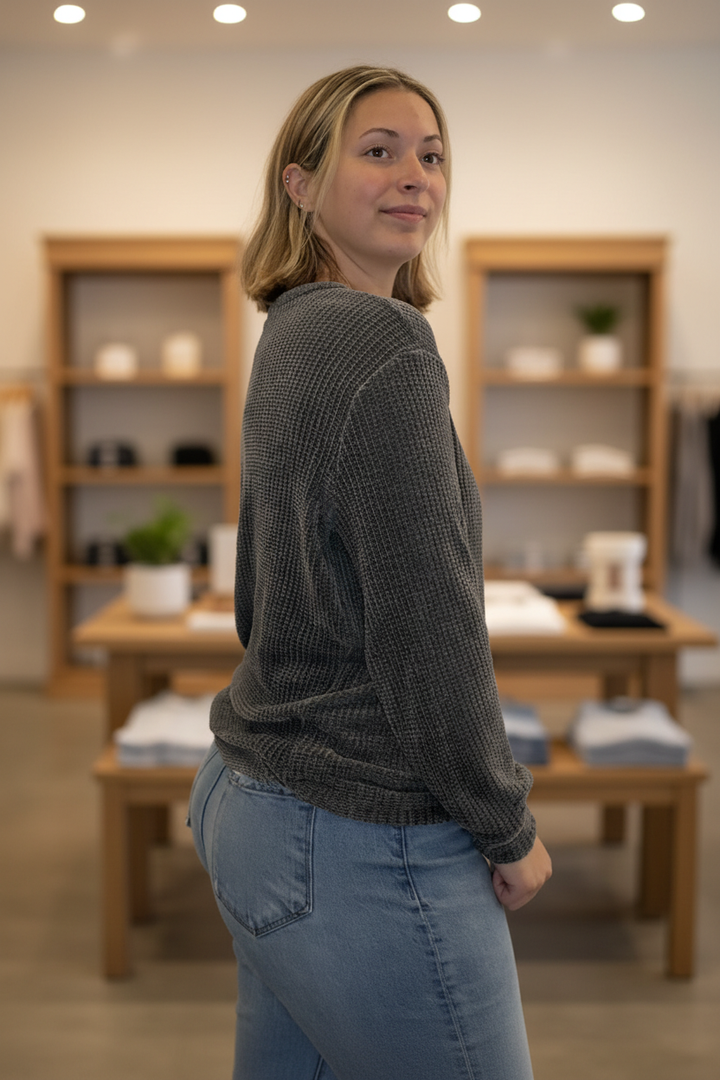 Side view with boutique background