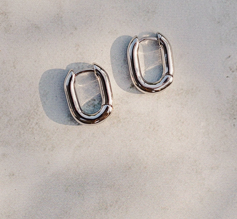 Silver Oval Huggie Earrings – White Gold Plated Minimal Everyday Hoops