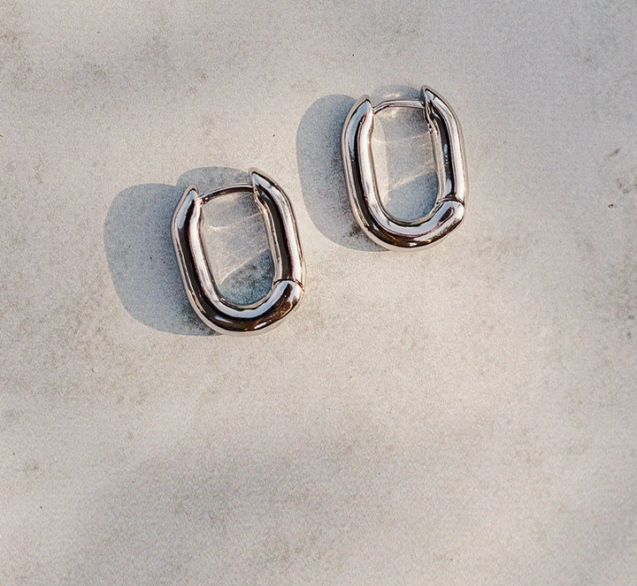 Silver Oval Huggie Earrings – White Gold Plated Minimal Everyday Hoops