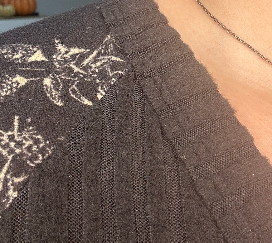 Black Button-Front Knit Top with Floral Sheer Sleeves